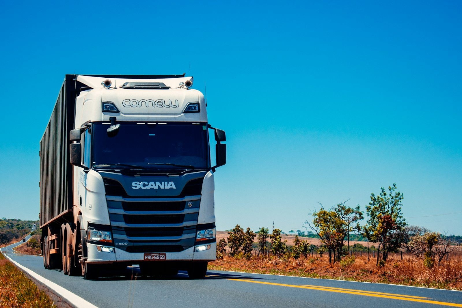 A long-haul freight truck on an open road